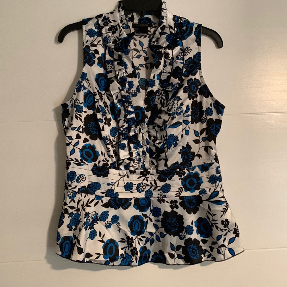 Large Sleeveless white top with blue and black flowers by My Michelle